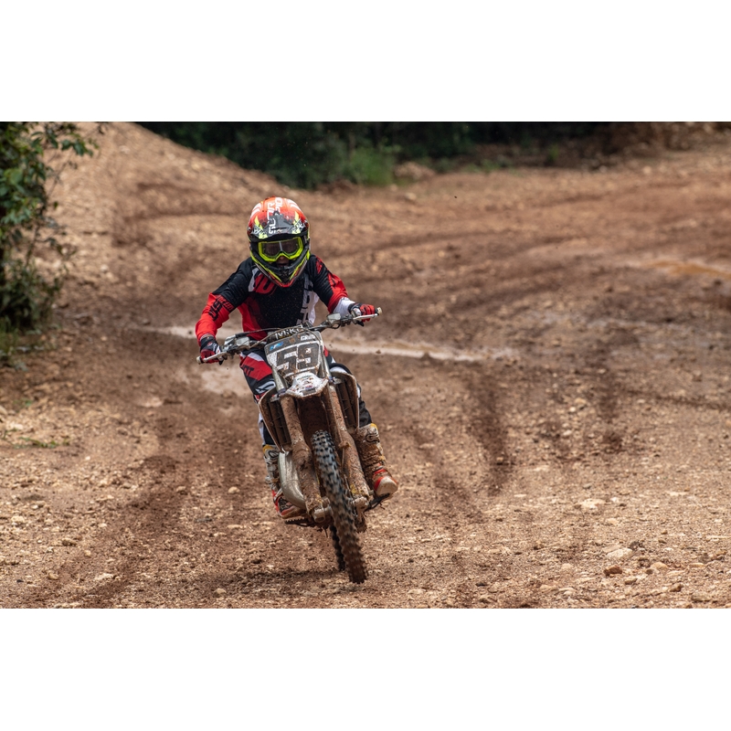A gyerekek Motocross nadrágja DEVO Ultimate Black-Red-et lőtt