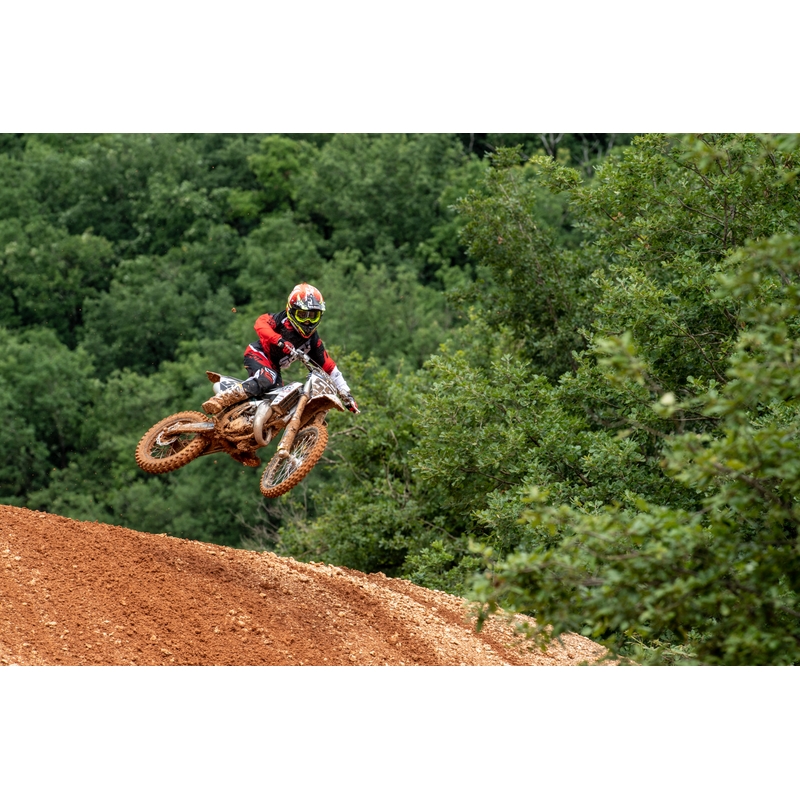 A gyerekek Motocross nadrágja DEVO Ultimate Black-Red-et lőtt